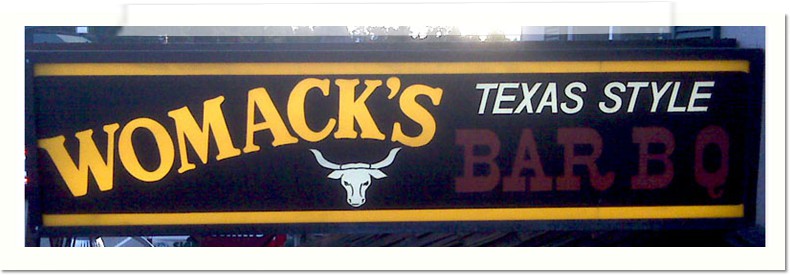 Womack's Backlit Sign
